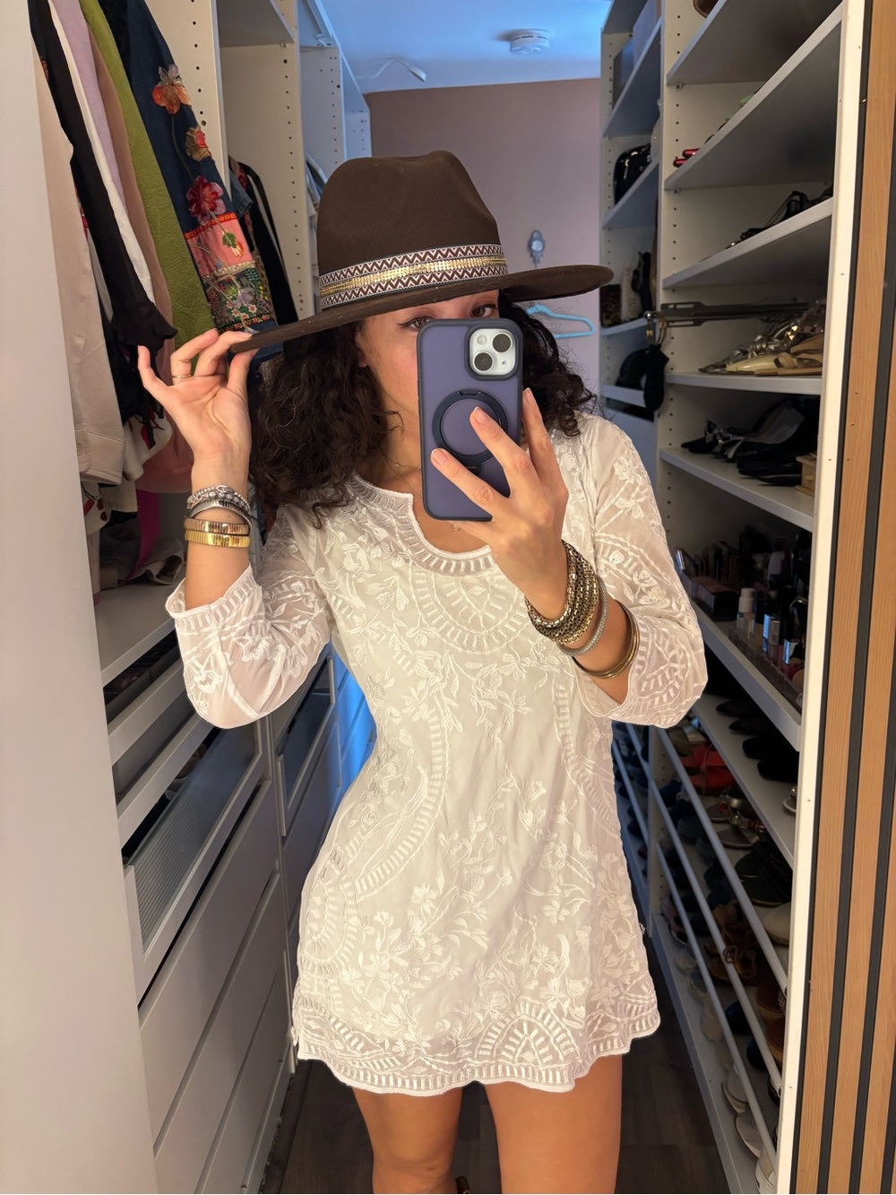 Brown felt cowboy hat with gold and red band